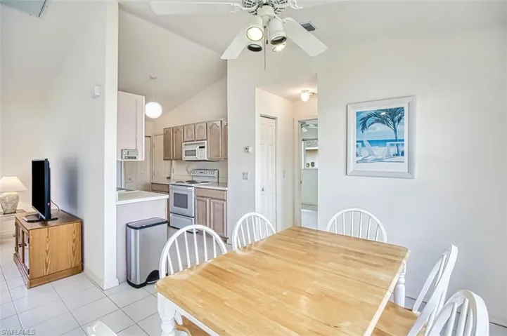 Dining area with view of kitchen