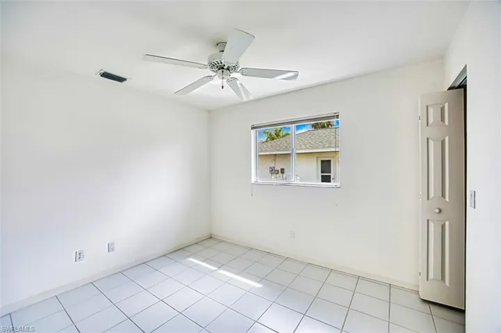 Guest bedroom with walk-in closet