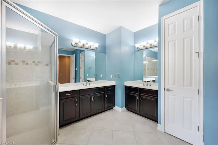 Master bath with his/her vanities