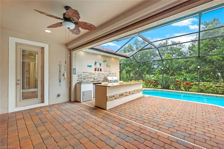 Pool bath entrance and outdoor kitchen