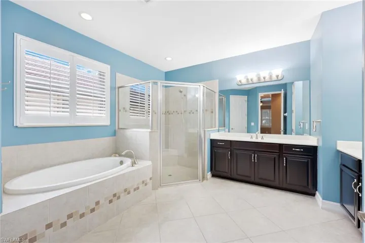 Master bath with walk in shower, large soaking tub and dual vanities