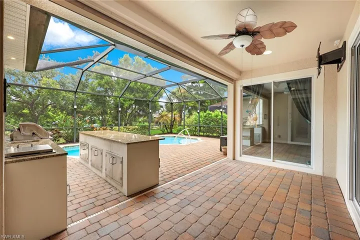 Outdoor kitchen & pool provide a great area for entertaining