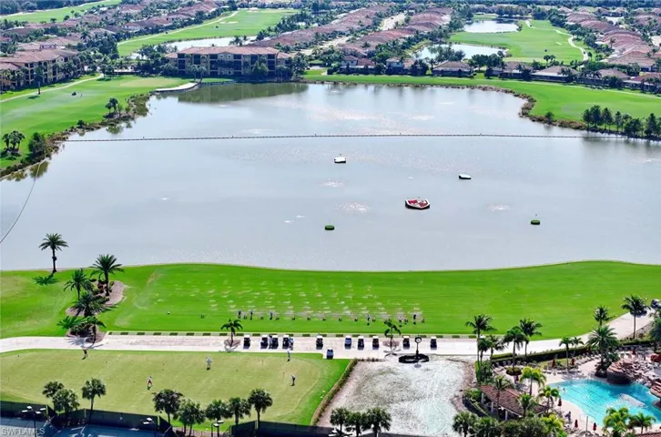 Bird's eye view of a large body of water and a local golf course