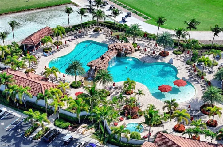 Community pool featuring a patio area