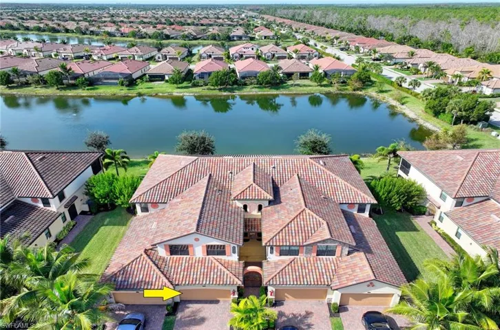Aerial view of residential area with a large body of water