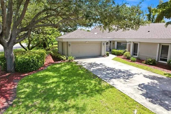 Landscaped with mature trees