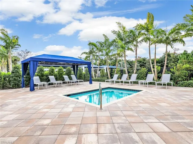 View of hot tub featuring a cabana