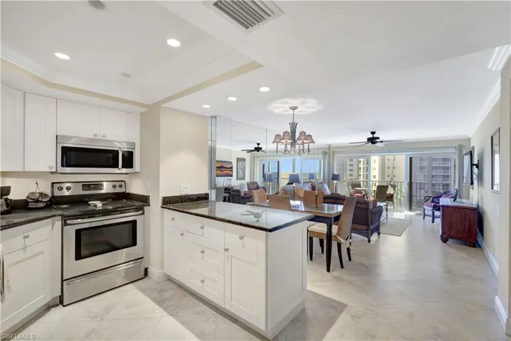 Kitchen view of Dining and Living area