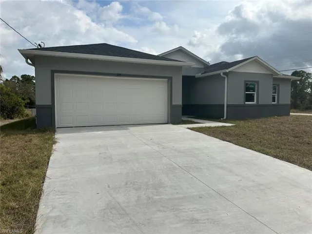 Ranch-style house with a garage