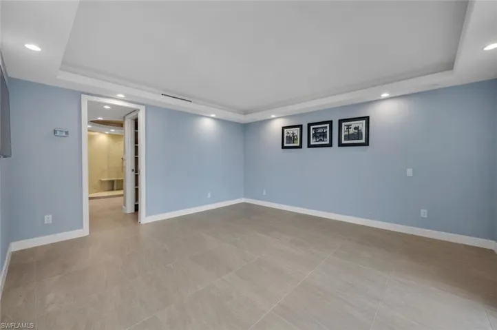 Primary Bedroom featuring light tile patterned floors