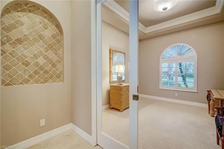 Den/Flex Room with glass paneled pocket doors