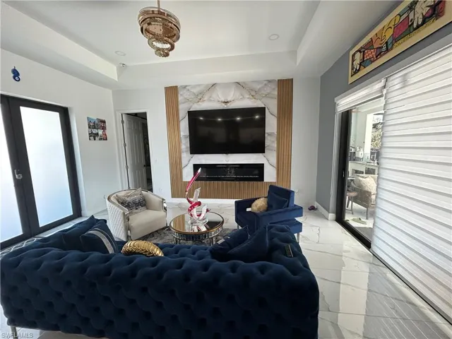 Living room with a raised ceiling