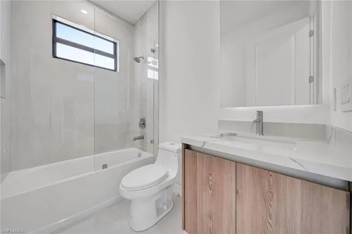 Full bath with vanity and shower / bathtub combination