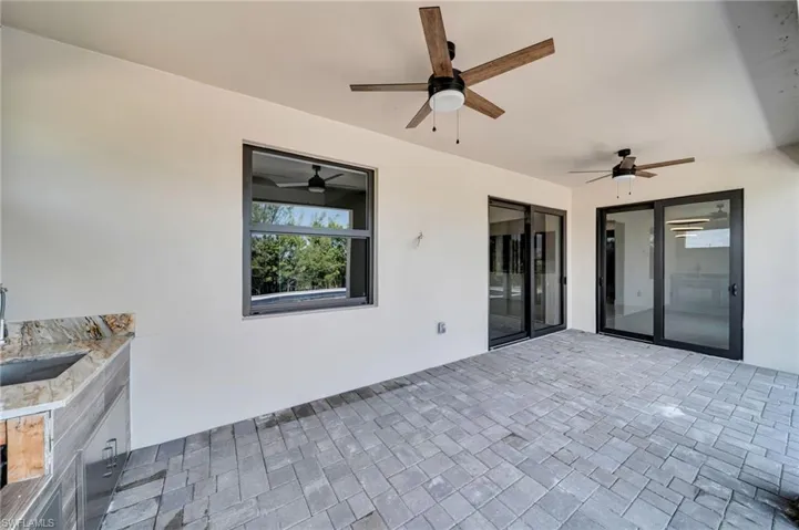 View of patio / terrace with ceiling fan