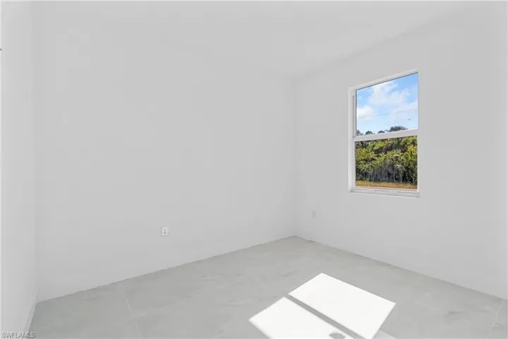 Empty room with baseboards