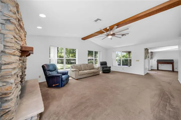 Wood Beam Ceiling with Newer windows and Fireplace ~ Front Entry