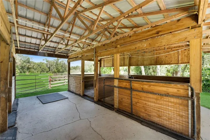 4-Stall matted concrete floors, electric and water
