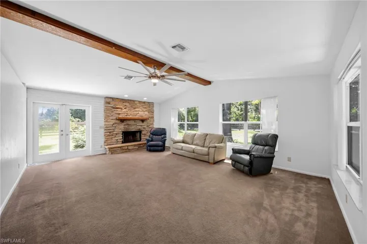 Wood Beam Ceiling, French Doors, Fireplace, updated windows