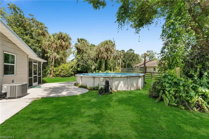 Above Ground Pool with side yard view