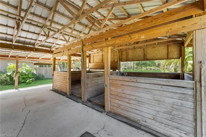 Inside barn, cement flooirng, matted