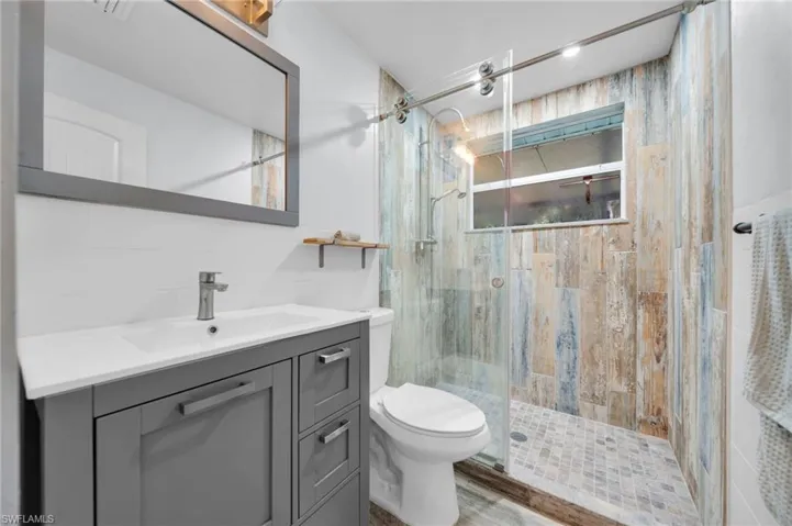 Updated Guest bathroom with glass shower doors
