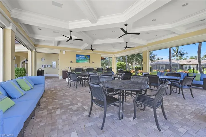 View of patio / terrace featuring outdoor dining area, outdoor lounge area, and a ceiling fan