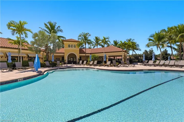 Community pool featuring a patio area