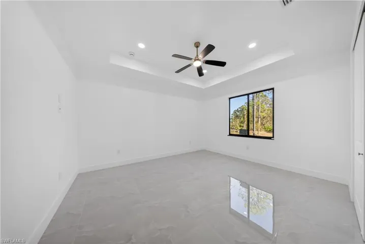 Spare room featuring a ceiling fan and recessed lighting