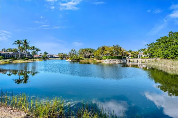 Complete, unobstructed views are the backdrop for your new home!  The Bird Sanctuary is home to many birds and animals...and a great place to go for a walk after dinner!