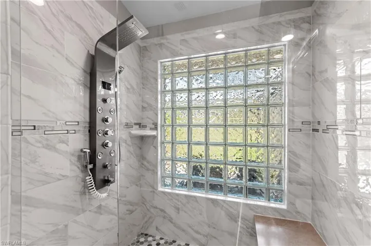 Master bathroom has a Rain shower panel and message body jets.