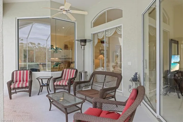 View of patio featuring ceiling fan