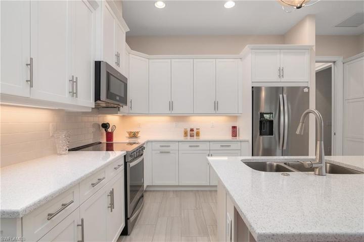 Lots of Quartz Counter Space, White Subway Tile backsplash.