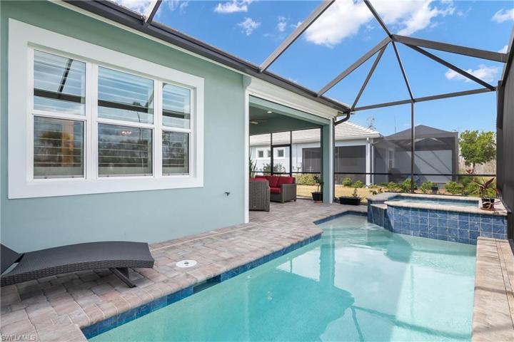 Heated Salt-Water Pool. Impact Windows and Doors. Electric Storm Smart Screens Enclose the Covered Lanai Area.