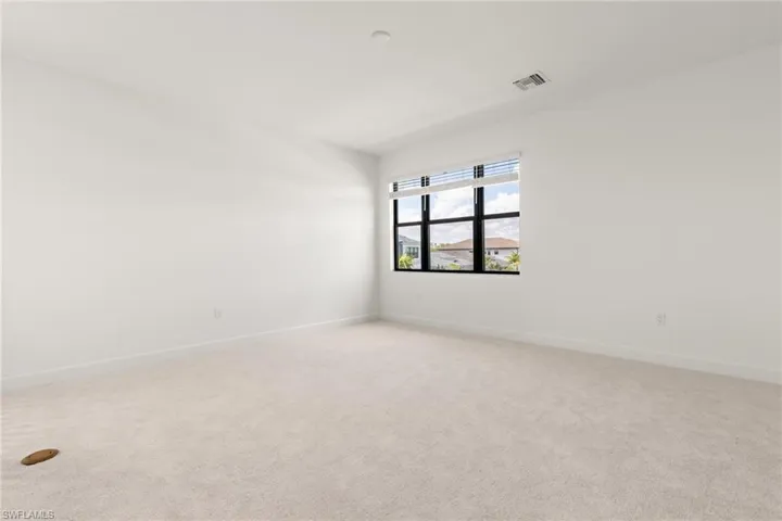Spare room with light carpet