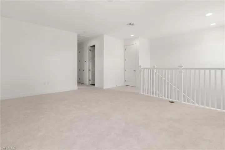 Spare room with light carpet