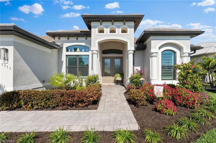 Entrance to property featuring french doors