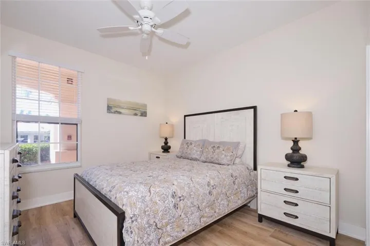 Bedroom with light wood-type flooring and ceiling fan