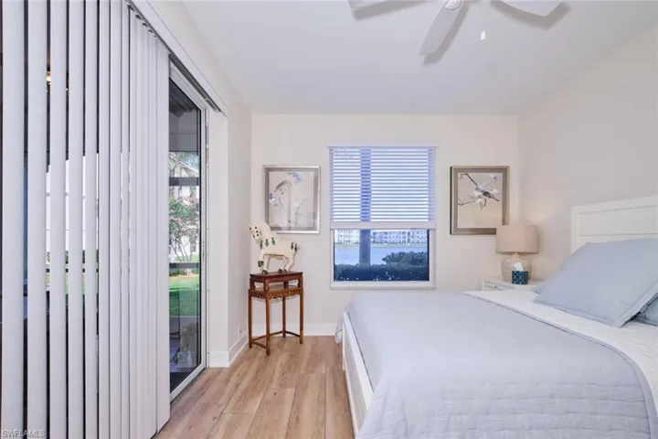 Bedroom with light wood-type flooring and ceiling fan
