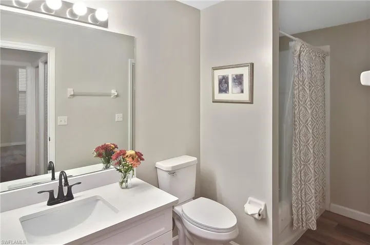 and adjacent to the guest full bath,