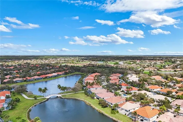 Aerial view of residential area with a nearby body of water
