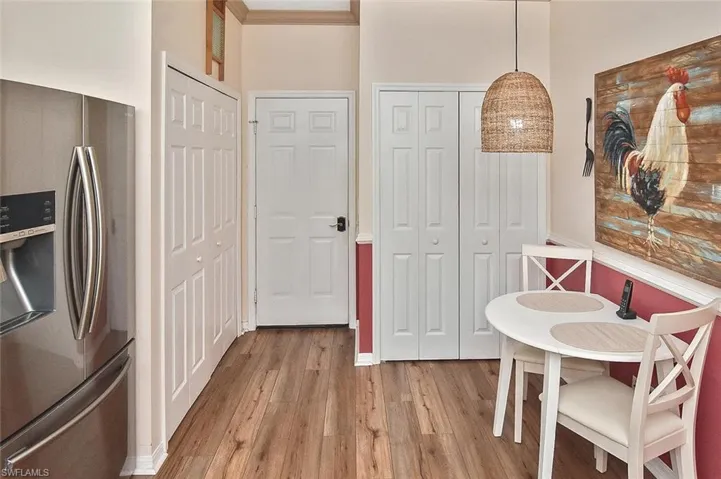 The double doors to the left hide the washer & dryer, the double doors to the right hide the pantry, and the garage door in the middle has a retractable screen!
