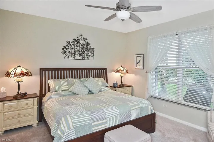 The serene primary suite is a peaceful retreat....
