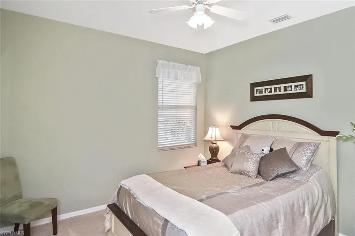 Guest bedroom #1 in a soothing and calm shade of green.
