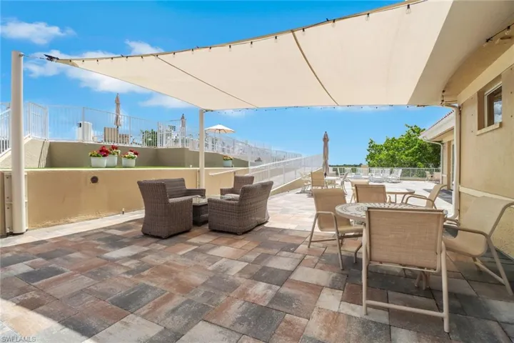 View of patio with outdoor dining space