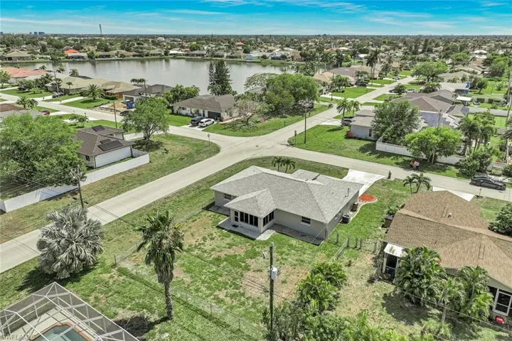 LARGE CORNER LOT-ARIEL SHOT OF THAT NEW ROOF!