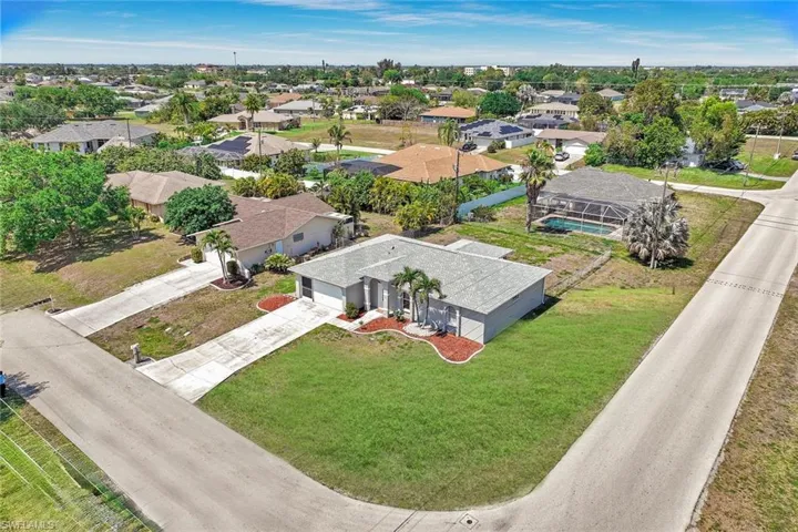 Large Corner lot, EASY access to Del Prado, Pine Island Road and Pondella. This is a great location in a well established neighborhood in what is becoming the new "heart" of NE Cape Coral.
