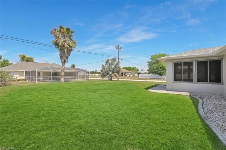 FENCED CORNER LOT WITH A GREAT BACK YARD