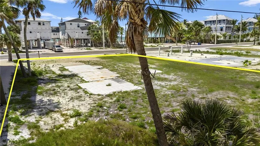 Surrounding community featuring a residential view and a yard  - Virtually Edited Image