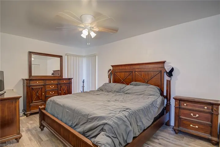 Bedroom featuring light wood-style floors and ceiling fan