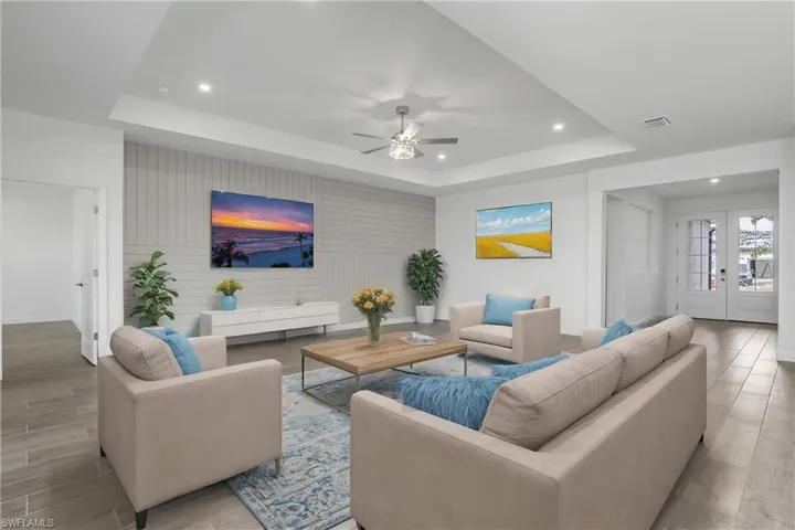 Open Floor plan is inviting and perfect for entertaining guests. Furniture digitally added.